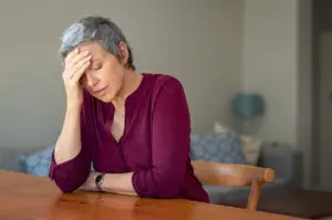 senior woman with headache